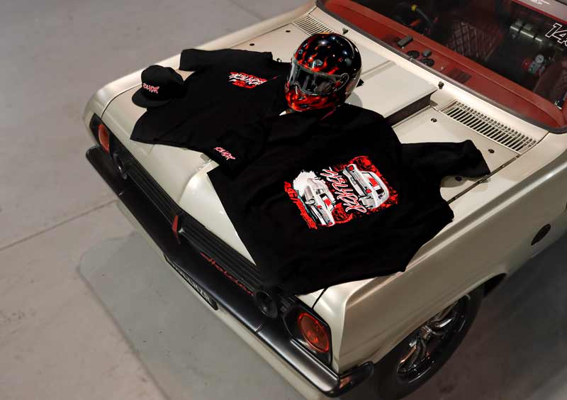 ASG Motorsport merch t-shirts on top of the car